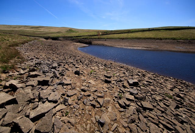 Dry banks at Dowry Reservoir in Oldham (Danny Lawson/PA)