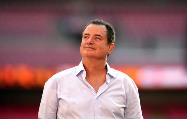 Hull City owner Acun Ilicali on the pitch following Hull's promotion