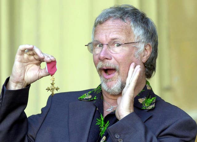 Bill Oddie poses with his OBE medal