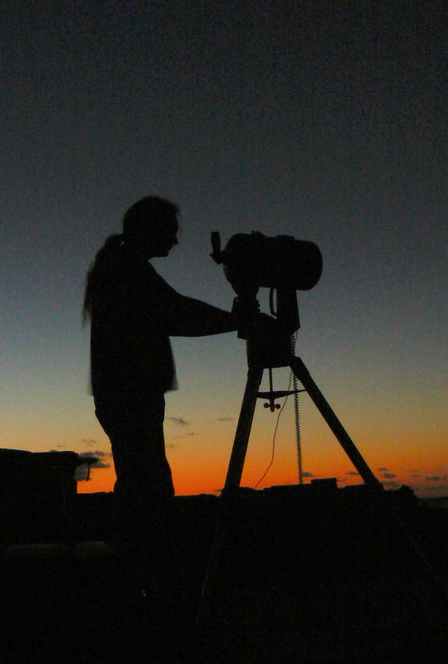 A member of Basingstoke Astronomical Society using a telescope