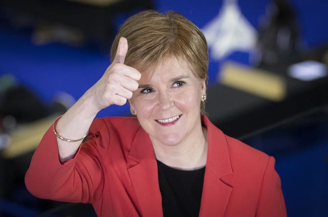 Sturgeon giving a thumbs up