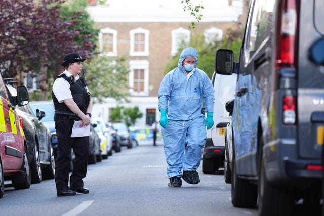 A forensics officer at the scene of an incident