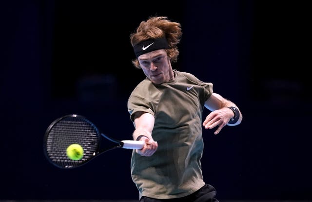 Andrey Rublev strikes a forehand during his loss to Stefanos Tsitsipas