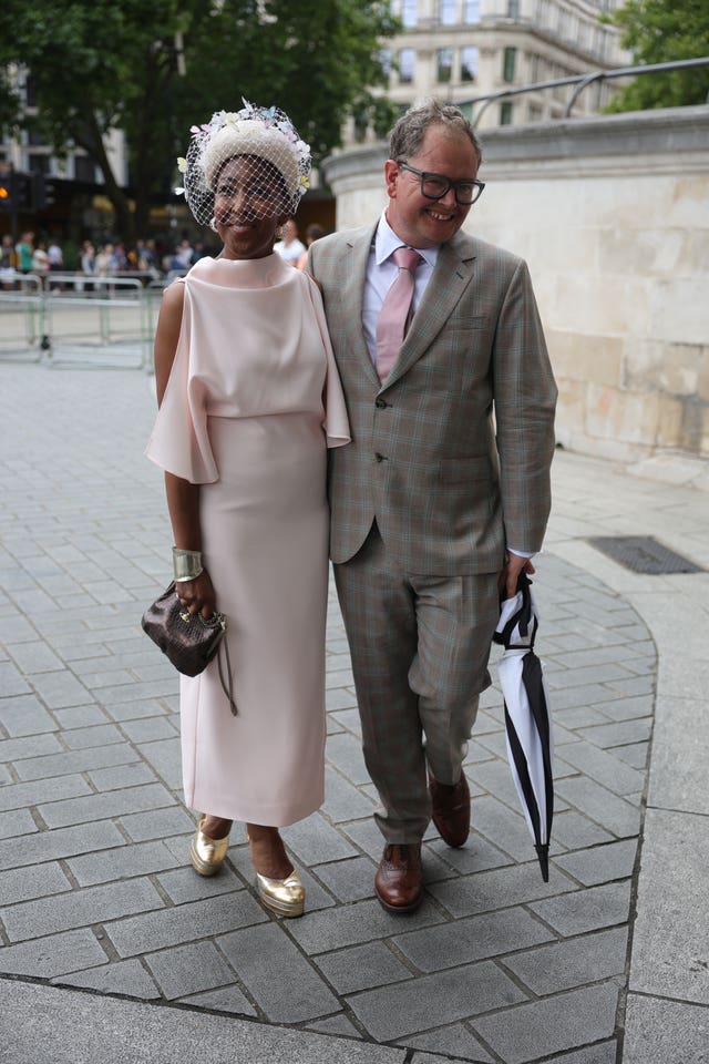 Angellica Bell and Alan Carr arrive for the wedding of Spice Girl Melanie Brown, Mel B, to fiance hairdresser Rory McPhee at St Paul’s Cathedral, London