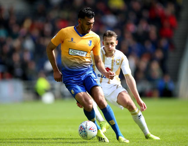 Mal Benning, pictured playing for Mansfield against MK Dons