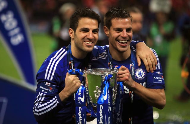 Cesc Fabregas, left, won the League Cup in his first season with Chelsea in 2014-15