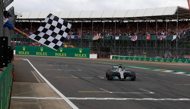 Mercedes Lewis Hamilton crosses the line to win the 2017 British Grand Prix
