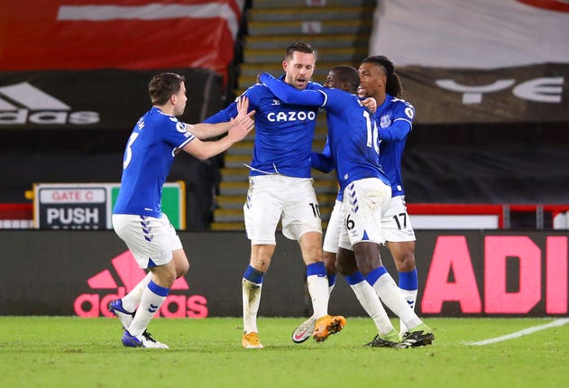 Gylfi Sigurdsson (centre) celebrates the winner
