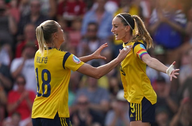 Kosovare Asllani, right, celebrates her goal against Portugal