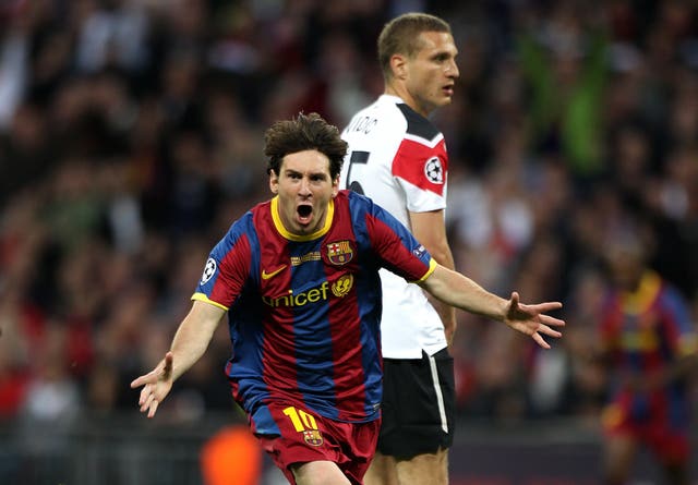 Lionel Messi runs away from Manchester United's Nemanja Vidic after scoring Barcelona's second in the 2011 Champions League final 