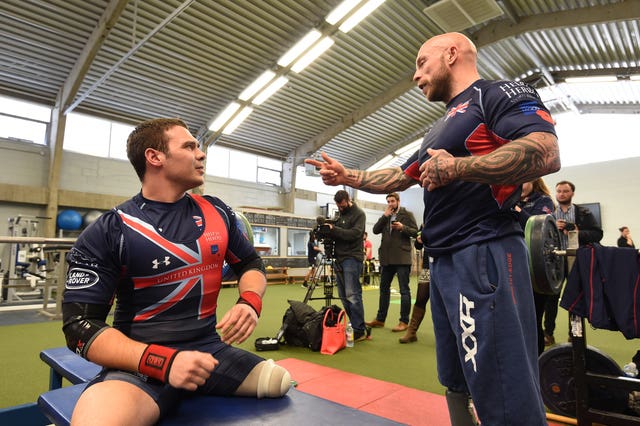 Micky Yule, right, gives some advice to Mark Stonelake during powerlifting training