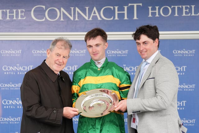 Alan O’Sullivan celebrates with JP McManus (left) and trainer Emmet Mullins