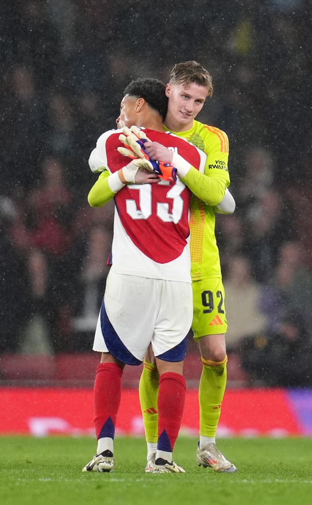 Jack Porter and Ethan Nwaneri embrace at the final whistle
