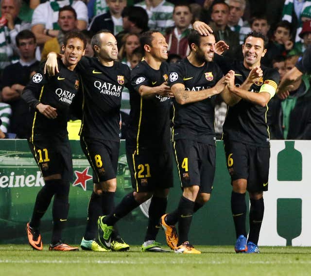 Cesc Fabregas, second right, had three trophy-laden seasons at Barcelona (Danny Lawson/PA)