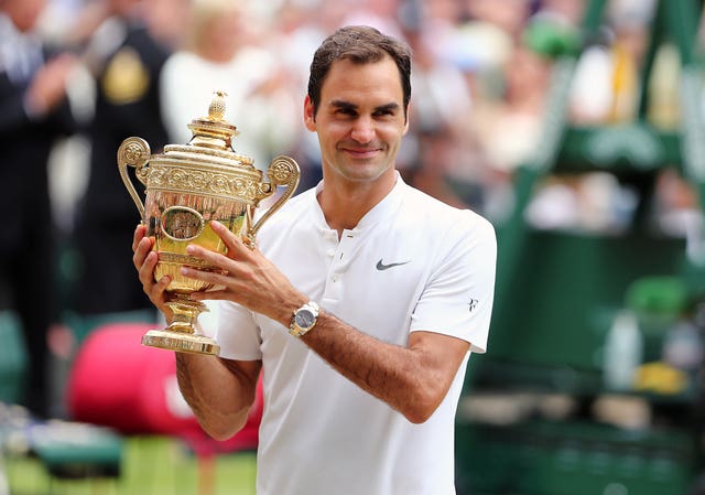 Roger Federer with Wimbledon 2017 trophy