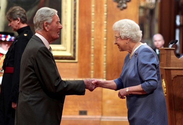 Peter Walwyn, seen here receiving his MBE, trained Humble Duty