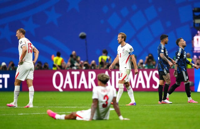 England’s Harry Kane (centre) and team-mates look dejected following defeat by Argentina in the World Cup semi-finals