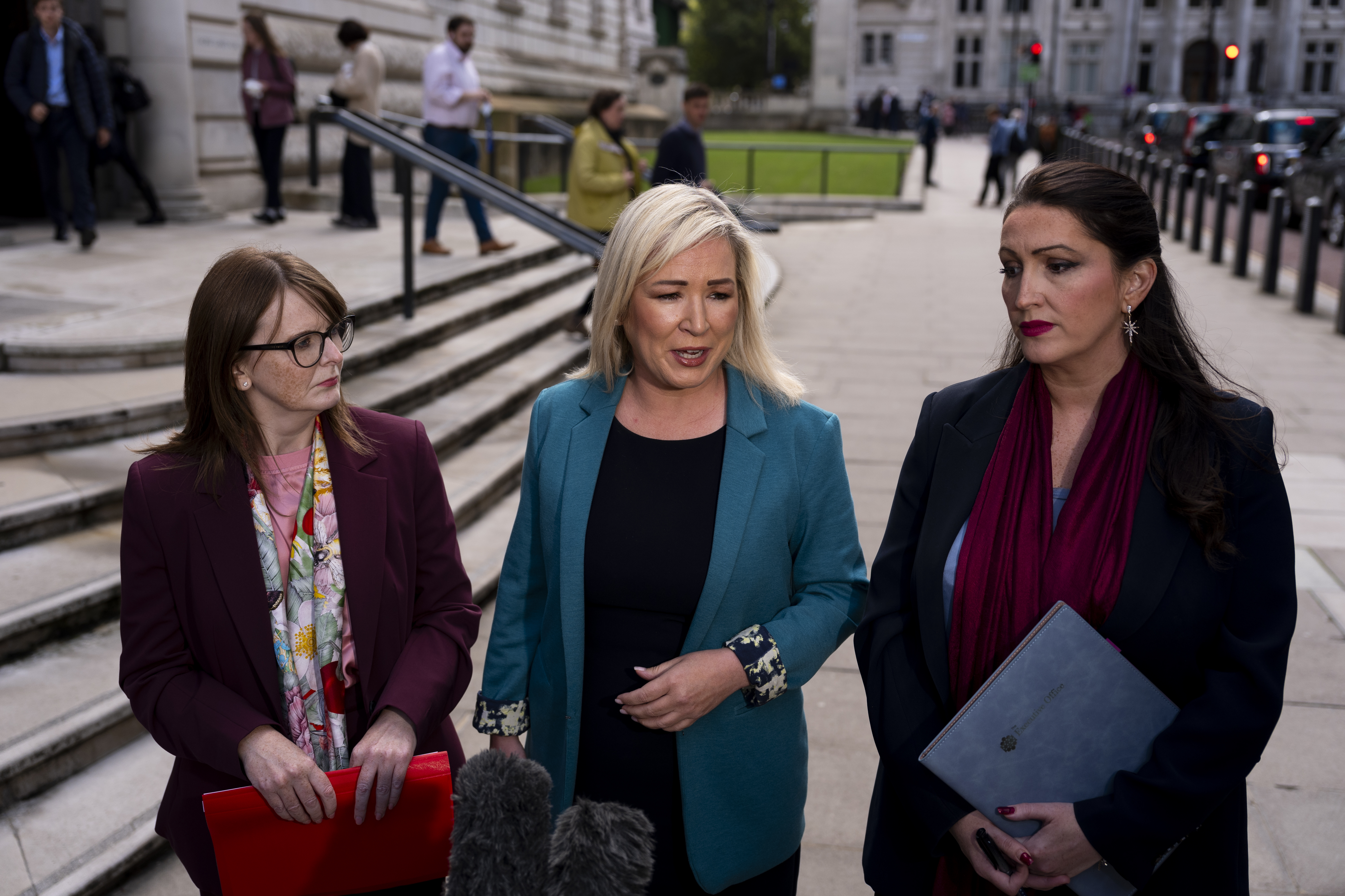 Caoimhe Archibald (left), First Minister Michelle O’Neill (centre) and deputy First Minister Emma Little Pengelly talk to the media ahead of meeting Chancellor Rachel Reeves at the Treasury in September