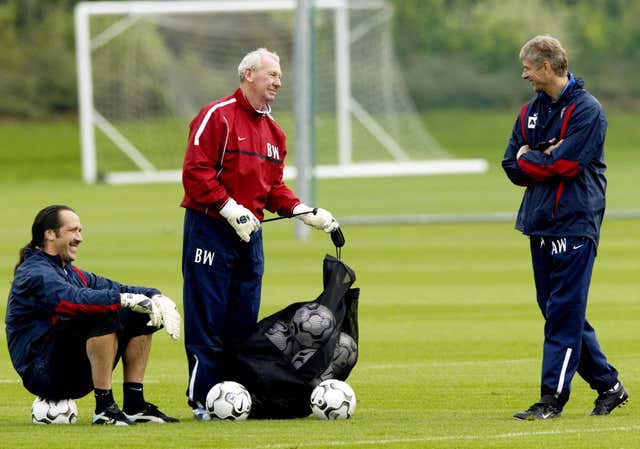 Wilson (centre) worked alongside Wenger and Seaman during his time as a coach at Arsenal