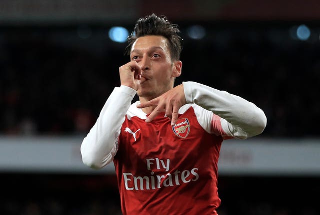 Ozil scored a sublime equaliser as Arsenal came from behind to beat Leicester.