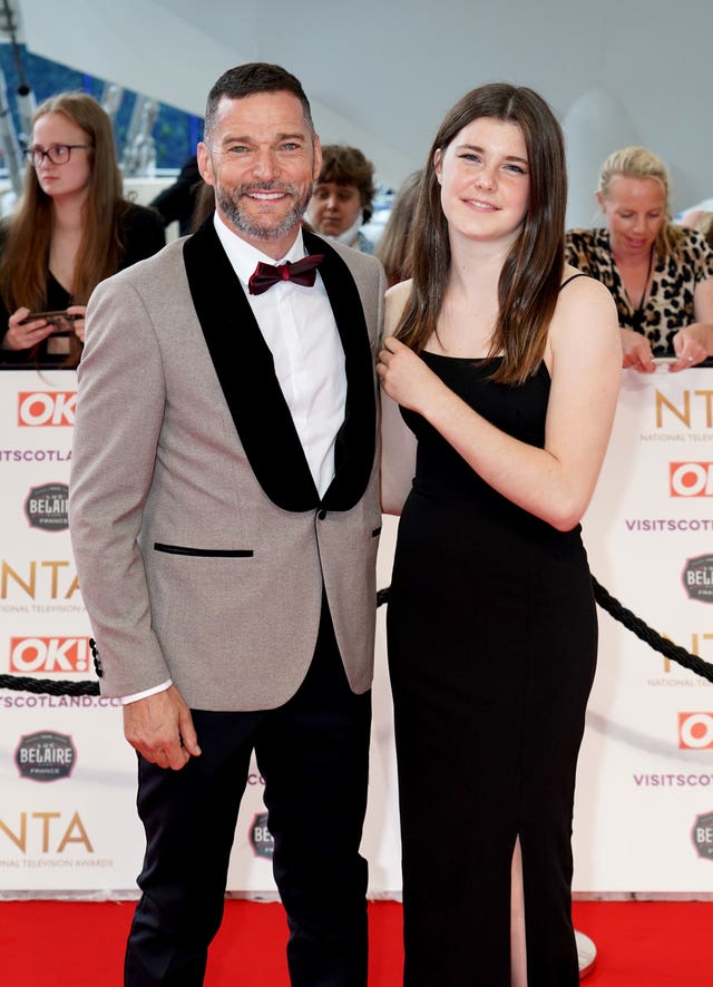 Andrea Spendolini-Sirieix alongside her father Fred Sirieix, at an awards ceremony on the red carpet.