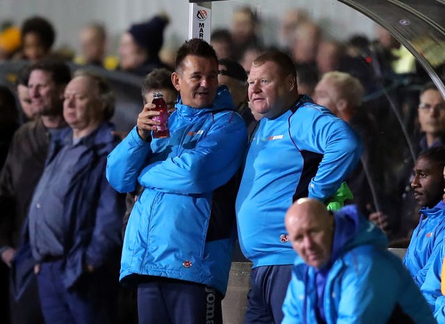 Sutton reserve goalkeeper Wayne Shaw (right) left his role at the club in the wake of the incident.