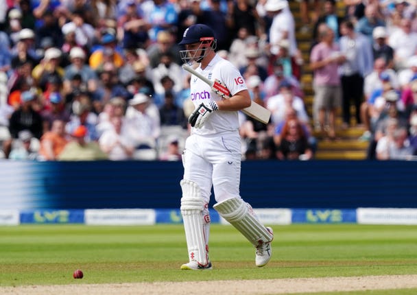 England’s Alex Lees walks off after being run out