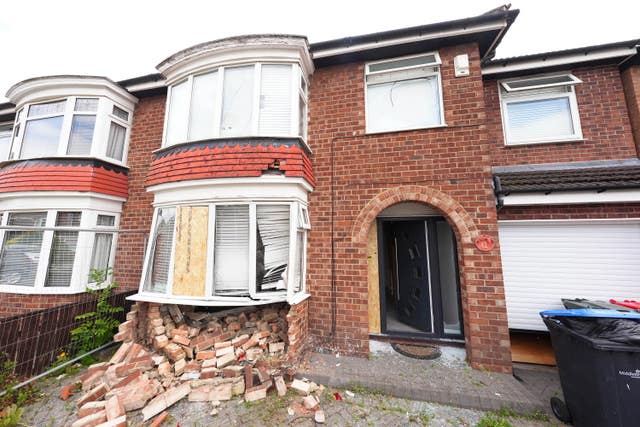 A house in Ruskin Avenue, Middlesbrough, after being rammed by a car