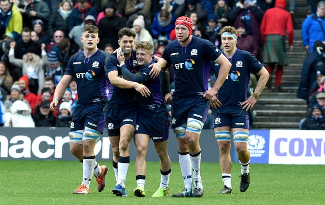 Scotland's Darcy Graham celebrates scoring his first Test try against Wales