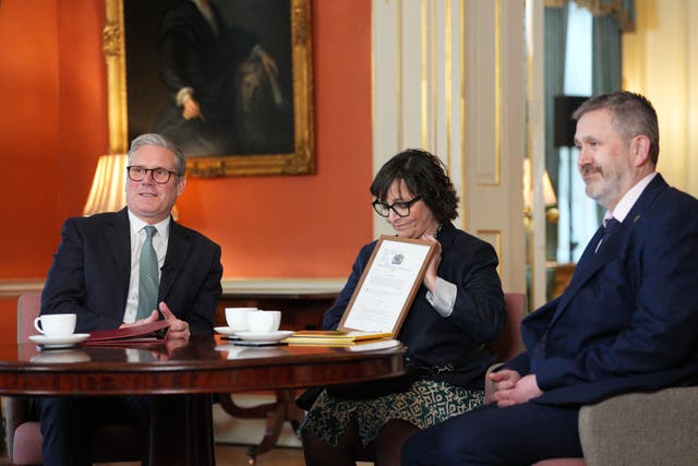 Prime Minster Sir Keir Starmer, left, with Figen and Stuart Murray