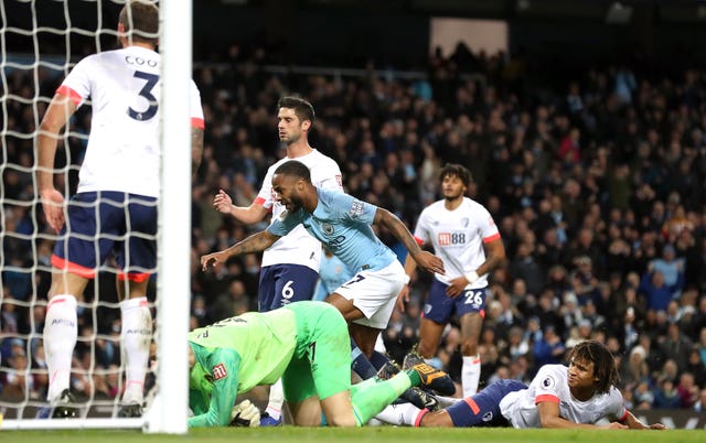 Raheem Sterling, centre, continued his hot streak in front of goal as Manchester City beat Bournemouth 3-1 on Saturday 