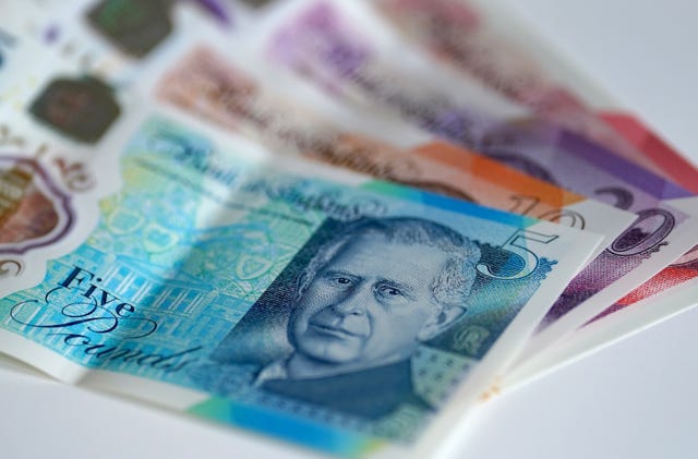 A close-up shot of English bank notes