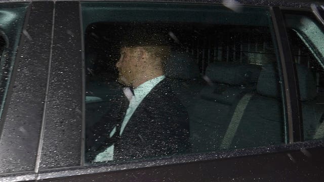 Harry seen through a car window as he arrives at Balmoral 