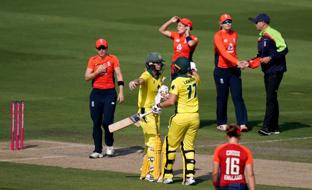 Australia's Ellyse Perry, centre left, and Meg Lanning celebrate another win over England in the Women's Ashes