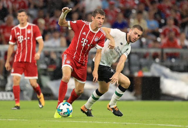 Thomas Muller, left, hand a hand in both Bayern''s goals