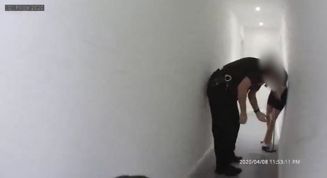 Police try to break up a house party in Eastbourne during lockdown