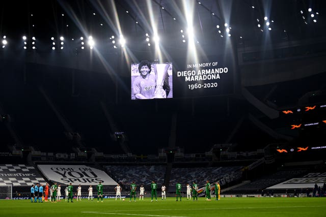 Players and officials observe a minute's silence at Tottenham Hotspur Stadium in memory of former Argentina player and manager Diego Maradona, who died on Wednesday 