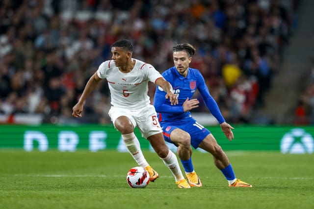 Manuel Akanji (left) is in Manchester City's sights