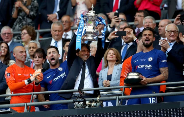 Antonio Conte, centre, won the FA Cup in his final match as Chelsea boss