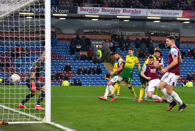 Grant Hanley, right, heads Norwich into the lead