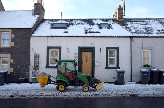 Pavements were being cleared in Lauder (Andrew Milligan/PA)