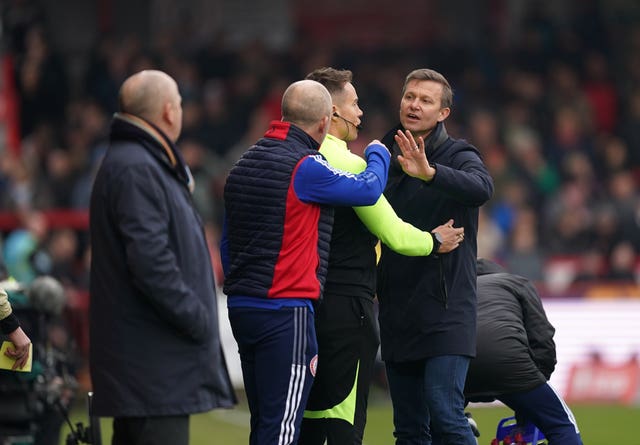 Leeds manager Jesse Marsch argues with Accrington assistant manager Jimmy Bell during the match
