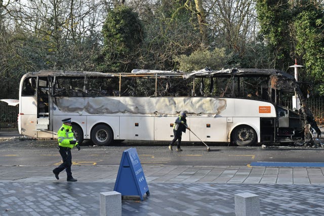 Burnt-out remains of bus