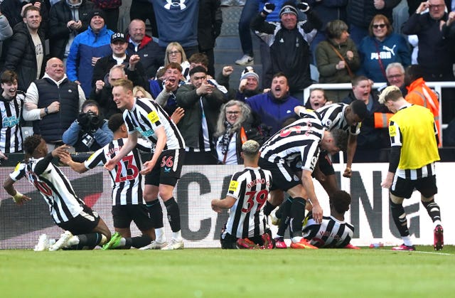 Joe Willock (second right) celebrates scoring against Manchester United