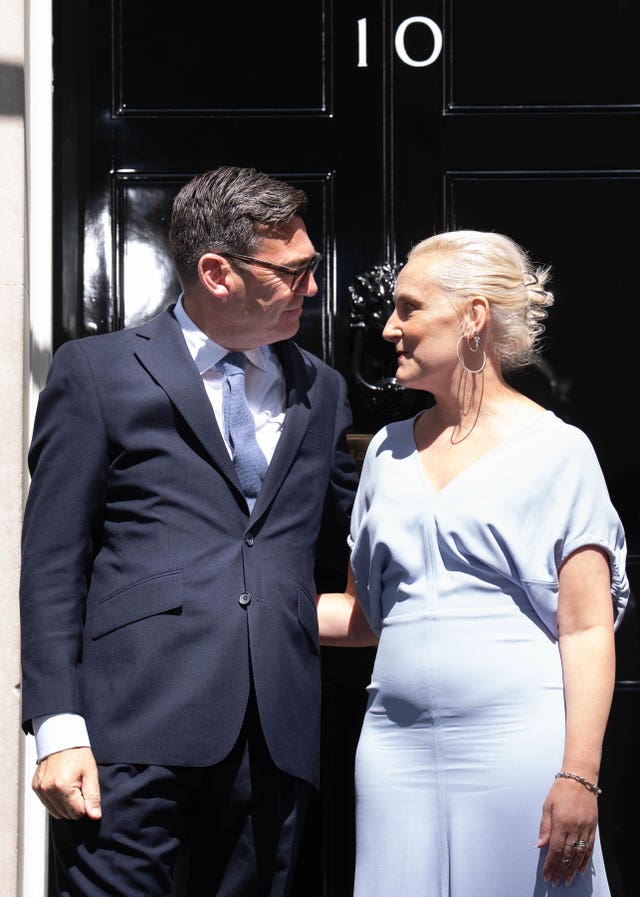Prime Minister Andy Burnham with his wife outside 10 Downing Street