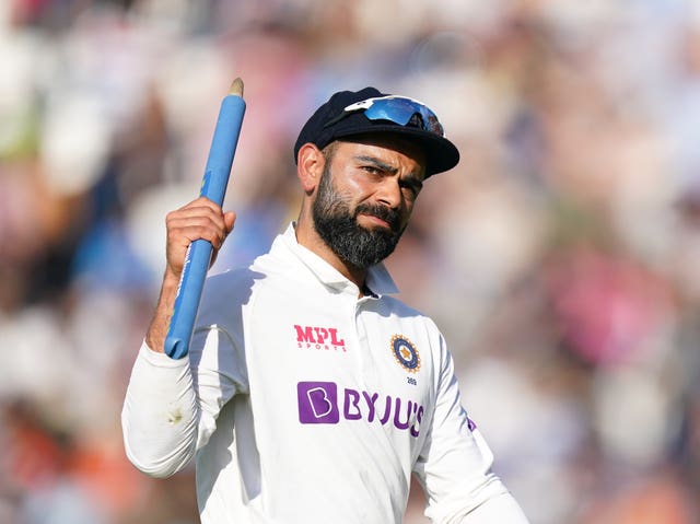 Virat Kohli celebrates after India's fourth Test victory over England at the Kia Oval