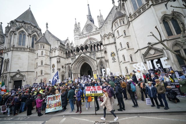 Supporters outside the Royal Courts of Justice in London, during the two-day hearing in the extradition case of WikiLeaks founder Julian Assange. 