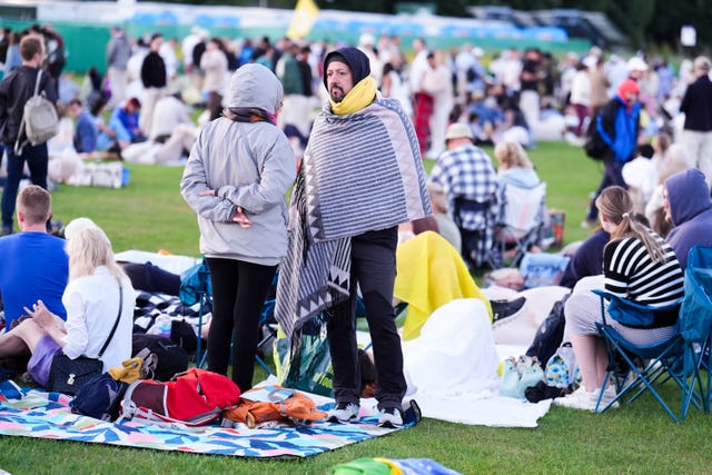 Spectators in the queue on day one of the 2026 Wimbledon Championships at the All England Lawn Tennis and Croquet Club, London