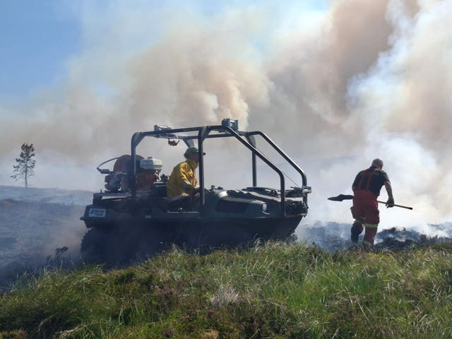 Firefighter with vehicle