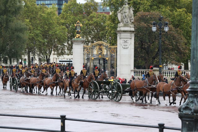 The King’s Troop Royal Horse Artillery proceed past Buckingham Palace, London, ahead of the State Opening of Parliament